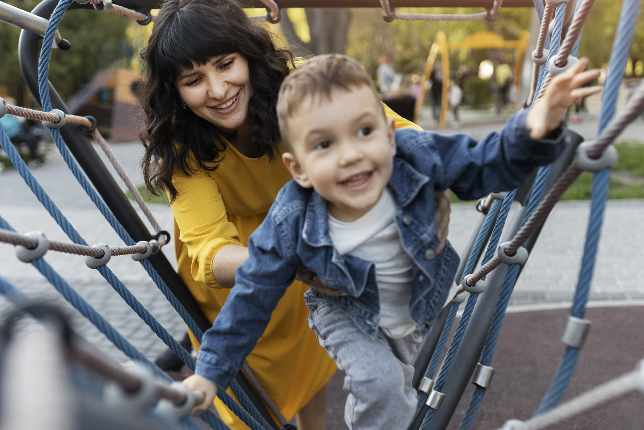 high-angle-kid-mother-playing-together